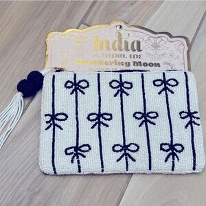 NWT Wandering Moon hand beaded travel pouch with black and white Bow Design